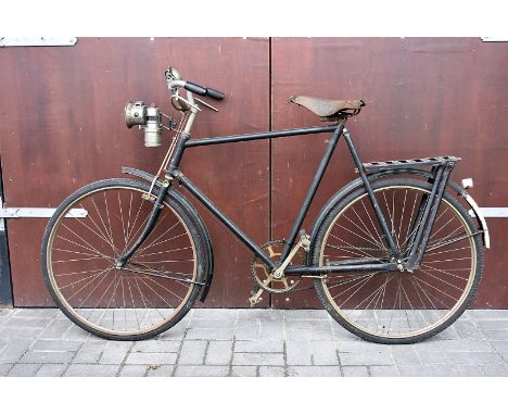 Cycling, A Raleigh Popular, Light Roadster Gents Bicycle. C 1925, in Black with green pin striping original decals, rod brake