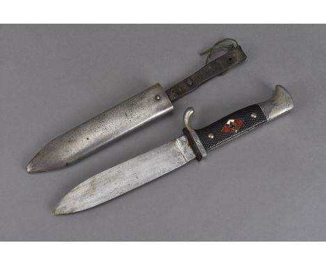 A WWII Third Reich Hitler Youth dagger, by RZM, marked M7/40, having enamel swastika in red ad white diamond shaped enamel de