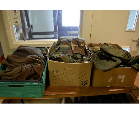 A large collection of various uniforms, including green smock combat 1968, smock combat camo, C/W coat woodland camo, dress j