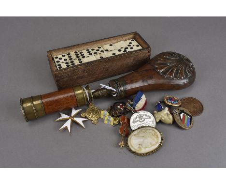 A collection of miscellaneous items, including an Order of St John breast badge, a set of Prisoner of War dominoes, a copper 