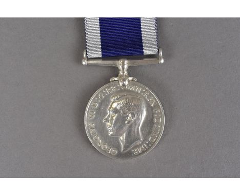 A George VI Royal Long Service and Good Conduct medal, with coinage profile 1937-48, awarded to K.66292 E.BASSETT L.STO. HMS 