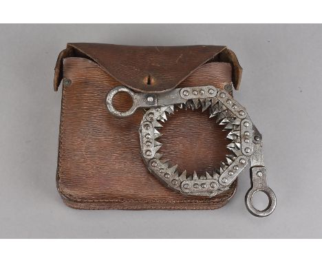 A WWII Engineer's coil saw,  by Tyzack Sons & Turner, bearing broad arrow mark, in fitted leather case 