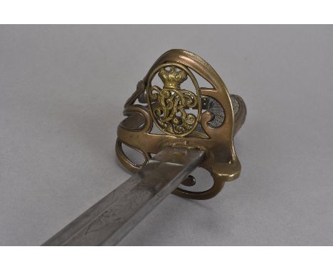 A Victorian Officer's Cavalry sword, by Gillott & Hasell, having engraved blade to both sides, with Royal Cipher, leading to 