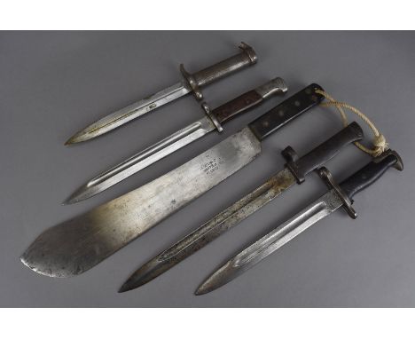 A group of four WWII bayonets, comprising an Austrian short carbine bayonet, marked WG to blade, a Turkish shorten German Ers