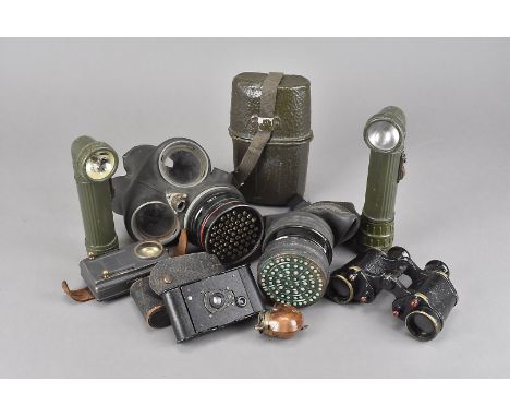 A WWII No.4 Mk III gas mask and bag, together with an earlier gas mask, two hand torches, a pair of No.2 Mk III binoculars, a