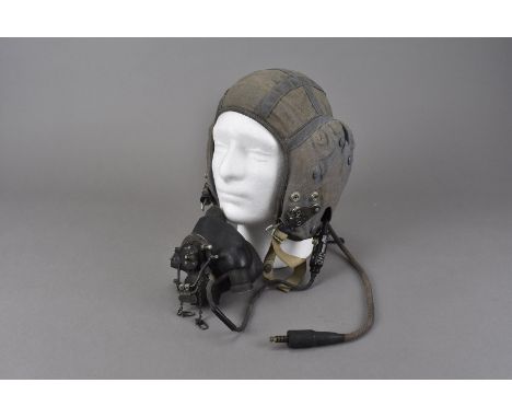 A Royal Air Force Flying Helmet Type G, marked with broad arrow, 22C/1732, size 4, complete with mask 