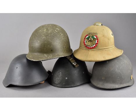 A selection of overseas military helmets, including a Dutch M34 helmet, having coat of arms to the front, an Italian Pith hel