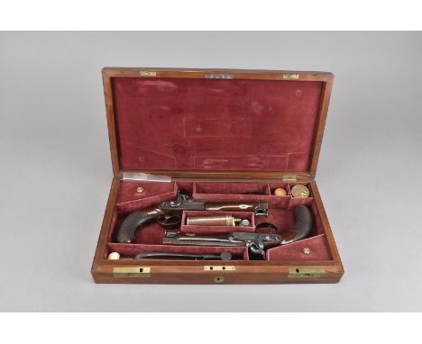 A cased pair of Wesley Richards percussion cap pistols, possibly duelling or target pistols, both marked to the top of the oc