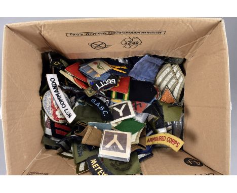 An extensive collection of British and Overseas cloth badges and epaulettes, comprising Princess Patricia's Canadian Light In