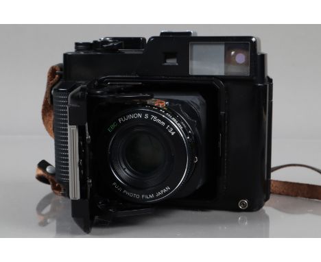 A Fuji 6 x 4.5 GS645 Professional Camera, serial no 3060272, shutter working, meter working, body G, some light surface wear 