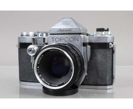 A Topcon R 3 Automatic SLR Camera, serial no 311180, shutter working, self timer working, body G, light wear, with Auto Topco