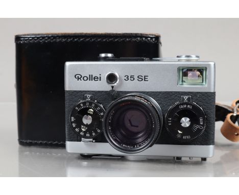 A Rollei 35 SE Compact Camera, chrome, made in Singapore, shutter working, not battery checked, body G-VG, with HFT 40mm f/2.