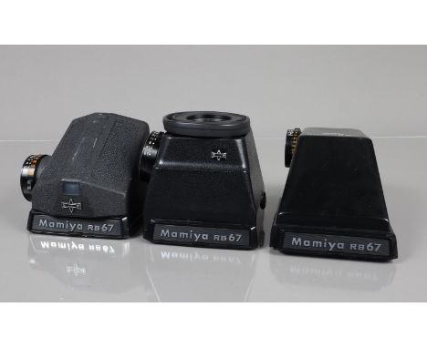 Three Mamiya RB67 Finders, a Mamiya RB67 PD Prism Finder, a metered prism finder, a metered chimney finder, all appear unresp