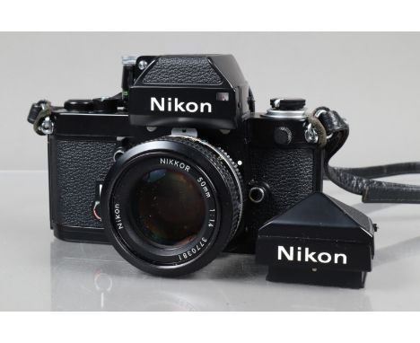 A Nikon F2 Photomic SLR Camera, black, serial no F2 7462221, shutter working, self timer working, with DP-1 finder, meter res