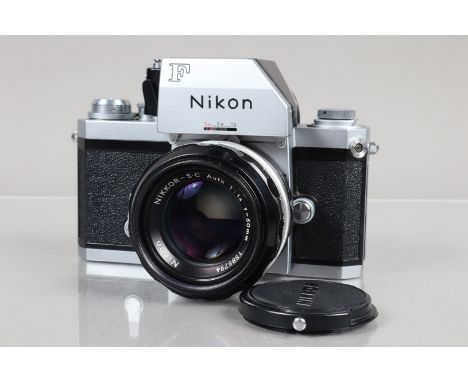 A Nikon F Photomic FTN SLR Camera, chrome, serial no 7243495, shutter working, meter responsive, self timer working, body VG,