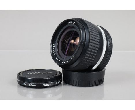 A Nikon Nikkor 24mm f/2.8 AI-S Lens, serial no 832143, barrel G-VG, light wear, elements G-VG, with front/rear caps and LIBc 