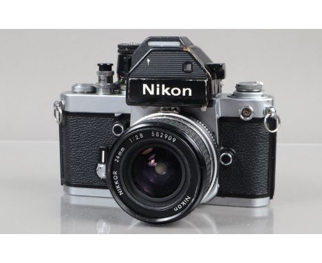 A Nikon F2 Photomic SLR Camera, chrome, serial no 7818296, shutter working, self timer working, with DP-2 finder, meter respo