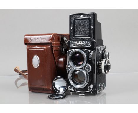 A Rolleiflex 2.8E TLR Camera, serial no 1650356, shutter working, meter responsive, body G, light paint wear to edges, with C