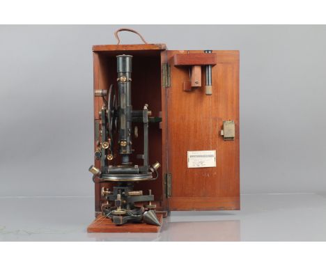 An early 20th Century lacquered and anodised brass Kelvin and James White Ltd 5inTheodolite,  with silvered micrometer reader