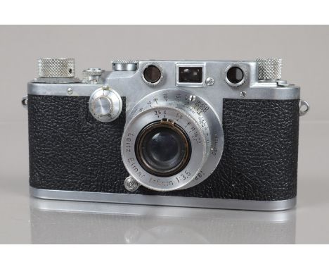 A Leitz Wetzlar Leica IIIc Rangefinder Camera, serial no 519293, 1950, shutter working, sticking on one second, some creasing