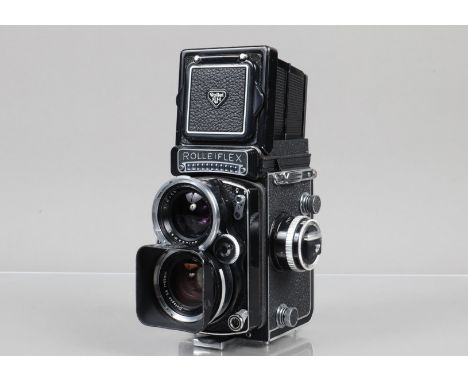 A Wide Angle Rolleiflex TLR Camera, serial no W 2493565, shutter working, meter responsive, body G, light wear to edges of vi