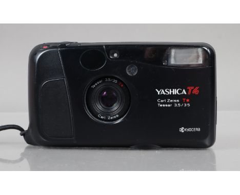 A Yashica T4 D Compact Camera, shutter working, flash working, self timer working, body G, some scratches, LED display functi