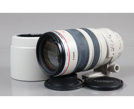 A Canon EF 100-400mm f/4.5-5.6 L IS Ultrasonic Lens, serial no 352037, auto focus working, barrel G-VG, some fading to grip, 