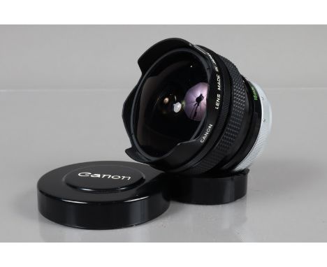 A Canon 15mm f/2.8 S.S.C Fish-Eye FD Lens, serial no 16072, barrel VG, elements VG, with Sky Y3 O R internal filters, with fr