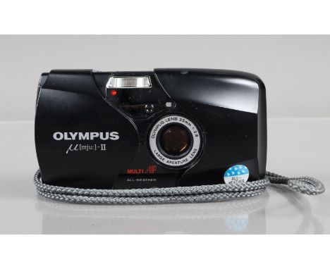 An Olympus mju II Compact Camera, black, powers up, shutter working, flash working, self timer working, body G-VG, elements G