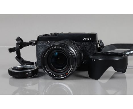 A Fujifilm X-E1 Digital Camera, serial no 31N50212, no battery or charger, untested, body G-VG, with Fujinon Aspherical Super