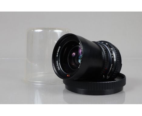 A Hasselblad Carl Zeiss T* 50mm f/4 Distagon Lens, serial no 6190675, barrel G, three tiny scratches, elements VG, in lens bu