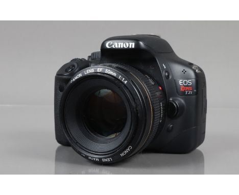 A Canon EOS Rebel T2i DSLR Camera, serial no 0322101213, powers up, shutter working, appears to function as should, body G, l