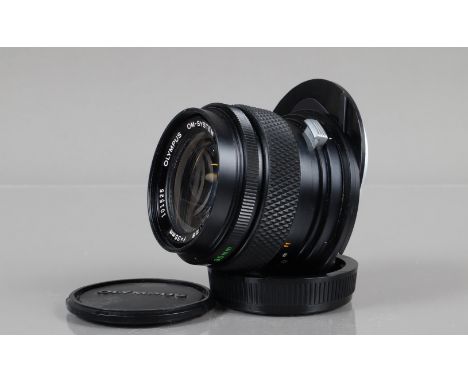 An Olympus Zuiko 35mm f/2.8 Shift Lens, OM mount, serial no 101525, shift moves freely, barrel G-VG, light wear, elements F-G