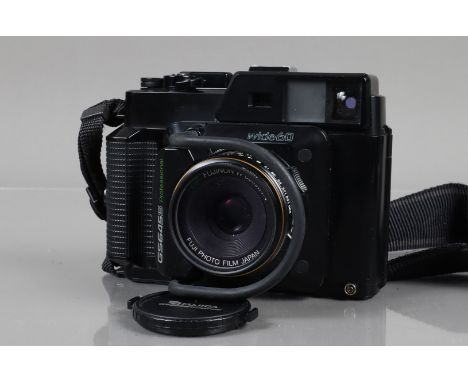 A Fuji 6 x 4.5 GX645 S Professional Wide 60 Camera, serial no 3036246, shutter working, meter working, body G-VG, light wear,