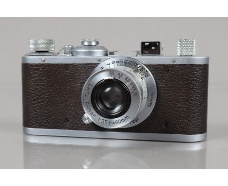 A Leitz Wetzlar Leica Standard Model E Camera, serial no 271205, 1938 shutter working, body G-VG, light wear, with Leitz 50mm