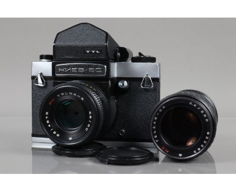 A Kiev 6C Camera,  serial no 8501937, shutter working, body G, some leatherette missing from bottom plate, otherwise VG, with