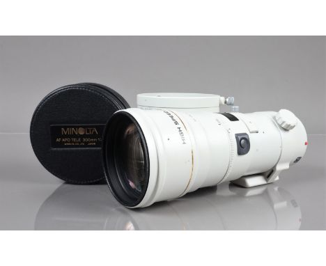 A Minolta High Speed AF APO 300mm f/4 Lens,  serial no 38501121, auto focus untested, barrel G, paint scratch on manual focus