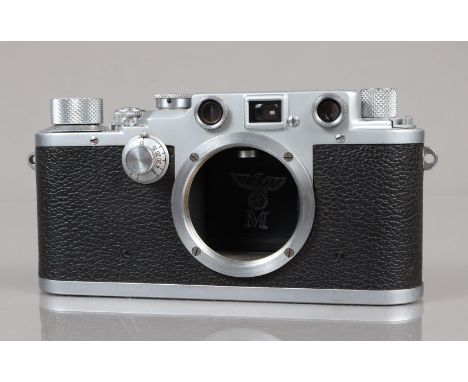 A Leitz Wetzlar Leica IIIc Rangefinder Camera, serial no 393973, 1943-46, shutter working, sticking/sluggish erratic on slow 