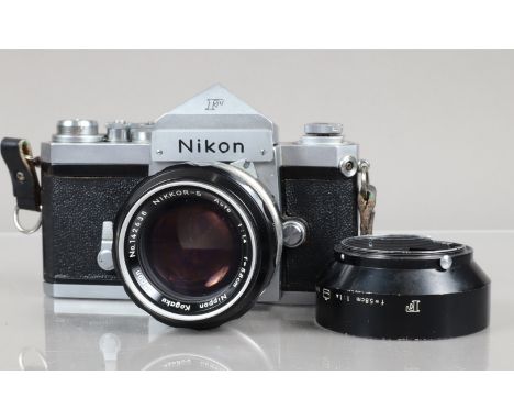 A Nikon F SLR Camera, serial no 6415080, shutter working, self timer working, body G, slight lifting to leatherette front top