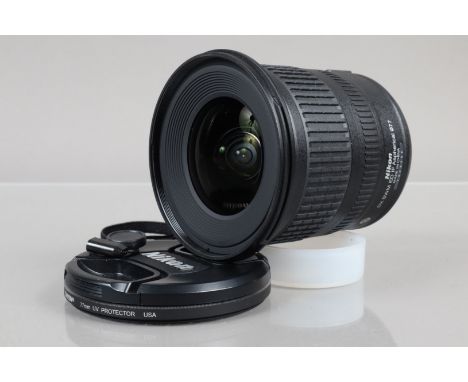 A Nikon DX AF-S Nikkor 10-24mm f/3.5-4.5G ED Lens, serial no 2079390, auto focus working, barrel G, UV pen scribing to one si