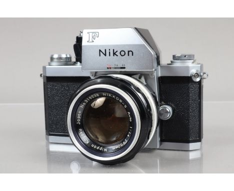 A Nikon F Photomic FTN SLR Camera, chrome, serial no 7200806, shutter working, meter responsive, self timer working, body VG,