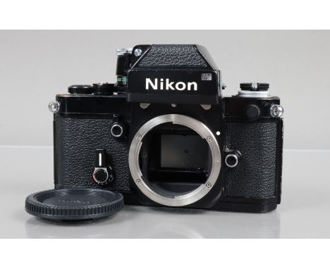 A Nikon F2 Photomic SLR Camera Body, serial no 7436500, shutter working, self timer working, with DP-1 finder, meter responsi
