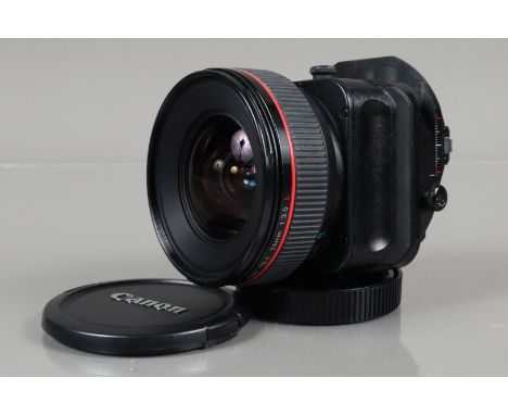 A Canon TS-E 24mm f/3.5 L Lens, tilt and shift lens, serial no 38178, communication with camera working, barrel G, some scrat