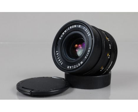 A Leitz Wetzlar 35mm f/2 Summicron-R lens, serial no 3283167, 1983, 3 cam, barrel G-VG, elements VG, with front and rear caps