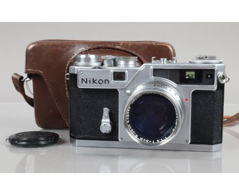 A Nikon SP Rangefinder Camera, chrome, serial no 6220011, shutter fast on slow speeds, rangefinder working, self timer workin