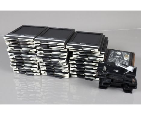 Thirty-Four Fidelity Elite 4 x 5 Film Holders, all complete, some light wear, overall G-VG, in worn case, with a Polaroid 545