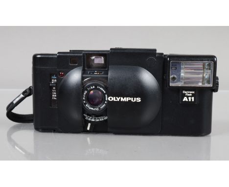An Olympus XA Compact Camera, shutter working, rangefinder working, self timer working, body G-VG, elements G-VG, with A11 fl