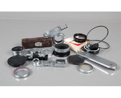 Leitz Accessories, including a HEBOO timer, a Vacu flash sync, goggles for dual focus Summicron lens, M mount macro goggles, 