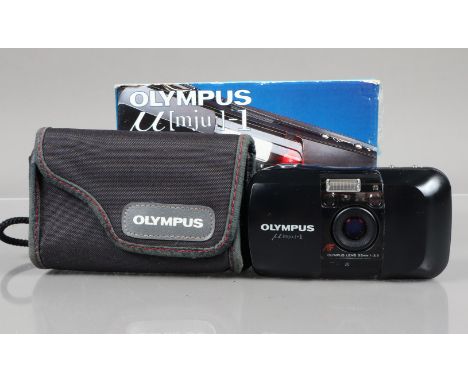 An Olympus mju-1 compact Camera, powers up, shutter working, flash working, self timer working, body G, light l wear, element