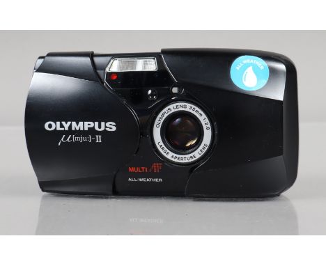 An Olympus mju II Compact Camera, black, powers up, shutter working, flash working, self timer working, body G, light wear, e